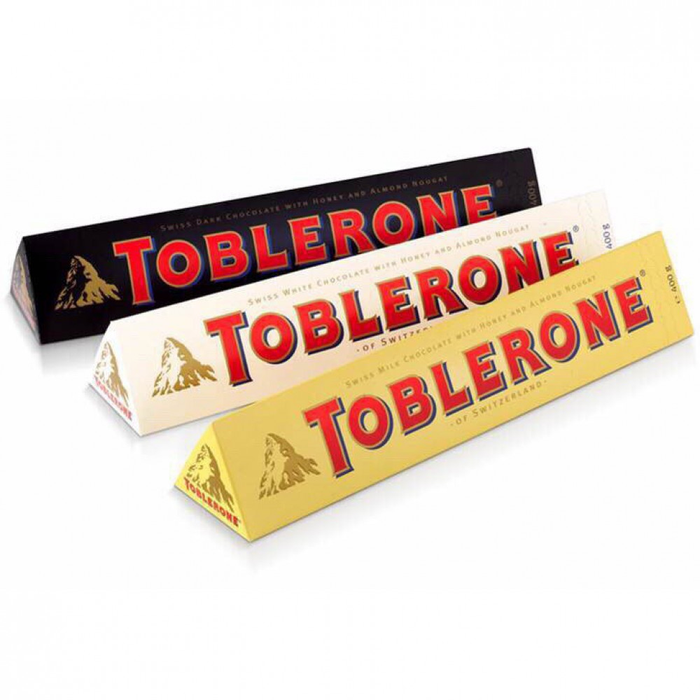 Шоколад toblerone купить. Швейцарский шоколад Тоблерон. Шоколадка треугольная Тублерон. Тоблерон треугольник шоколад. Toblerone 120 гр.